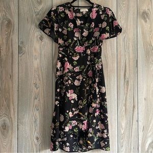 Monteau formal floral wrap dress w/ scalloped v-neck and flutter sleeves. Sz S